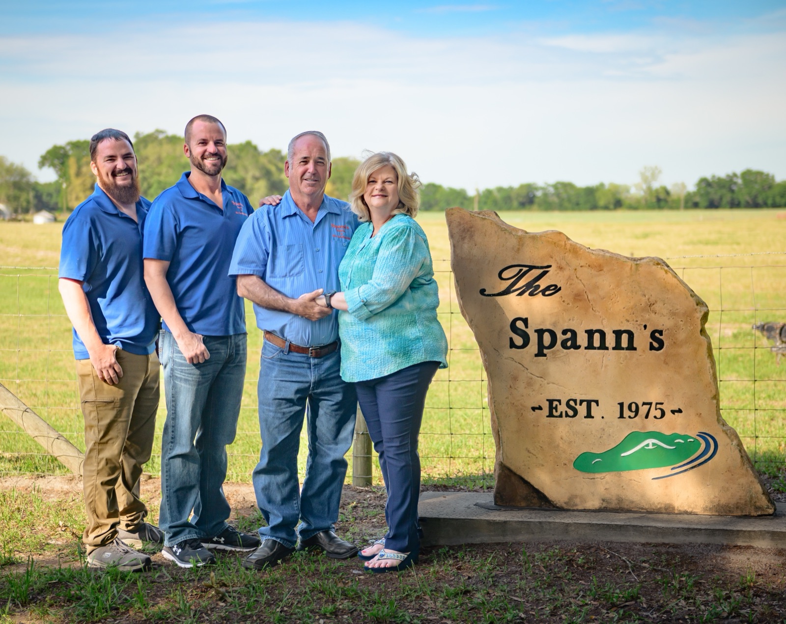 The Spann family beside their engraved “The Spann’s — Est. 1975” stone in Trenton, Florida
